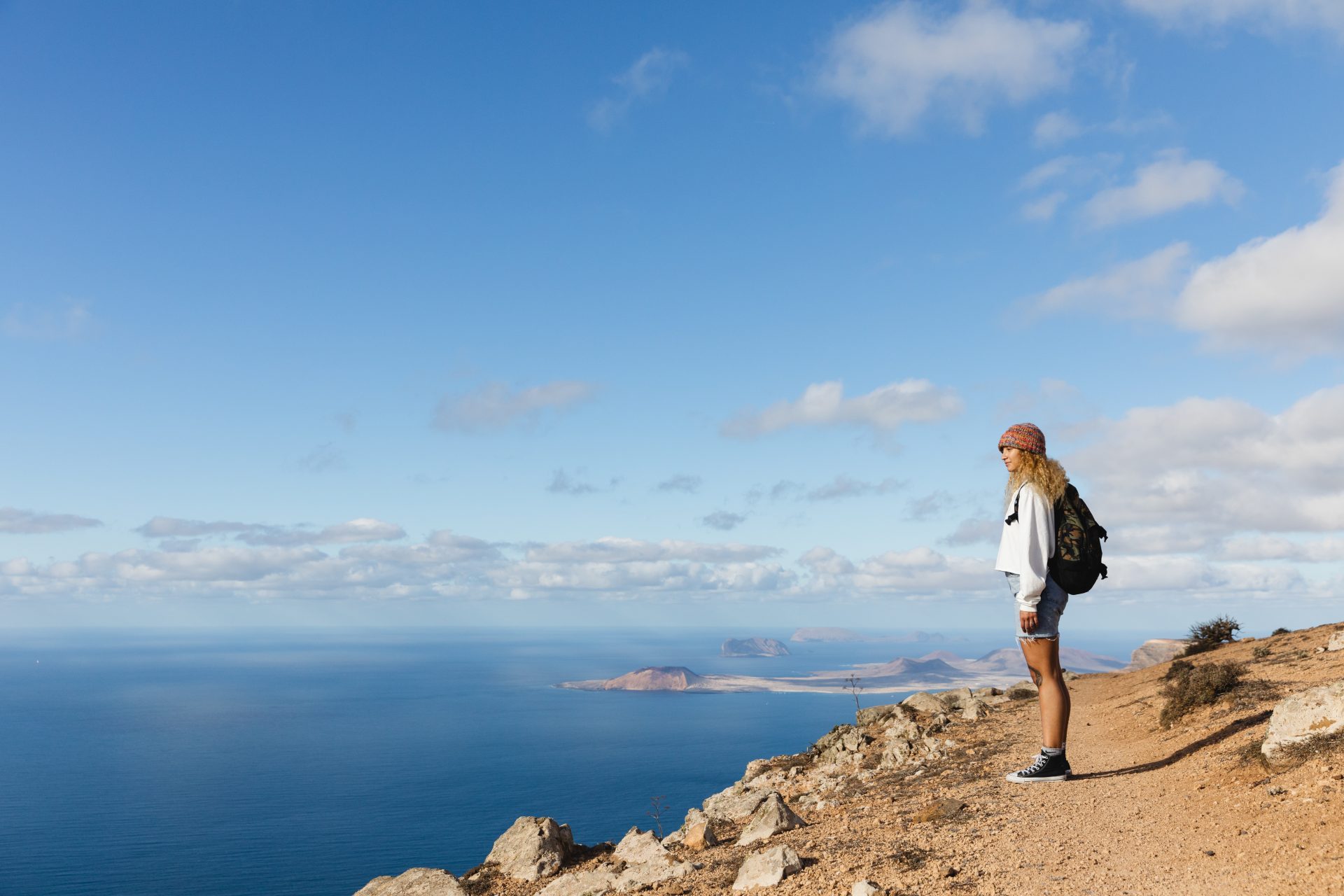 Woman looking at coastal scene